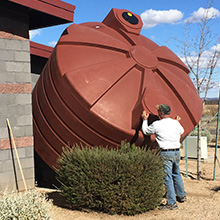 Man Lefting tank